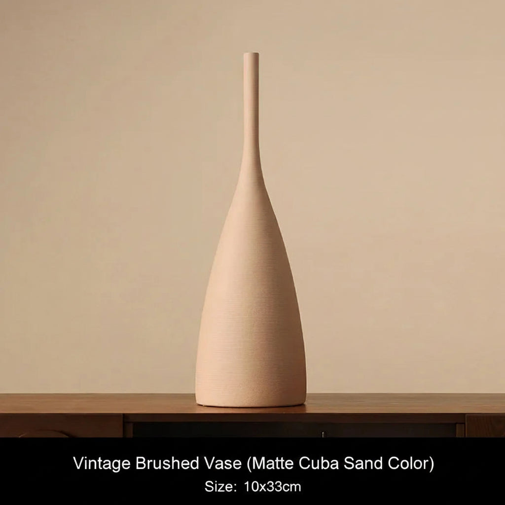 Matte Cuba Sand Beige ceramic vase on a wooden surface with a beige background