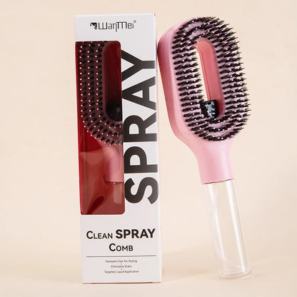 Pink hairbrush with clear handle next to its packaging on a beige background
