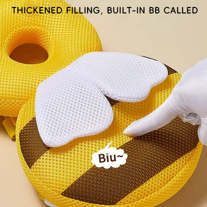 Yellow and brown U-shaped pillow with a thick white filling, labeled 'Biu~'.